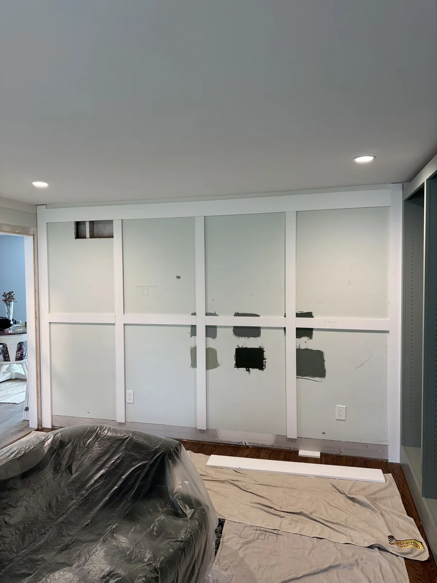 Crown moulding installation over custom cabinets, Newtown Square family room