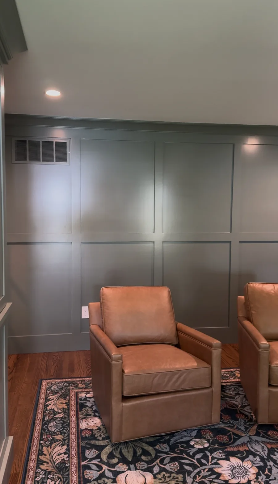 Decorative panel wall with HVAC register, finished family room Newtown Square PA